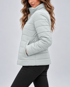 Mint green quilted puffer jacket pocket detail