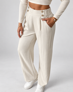 Beige office trousers button waist detail