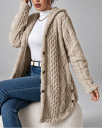 Cream longline teddy fleece cable knit jacket seated detail