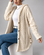 Cream longline teddy fleece cable knit jacket seated