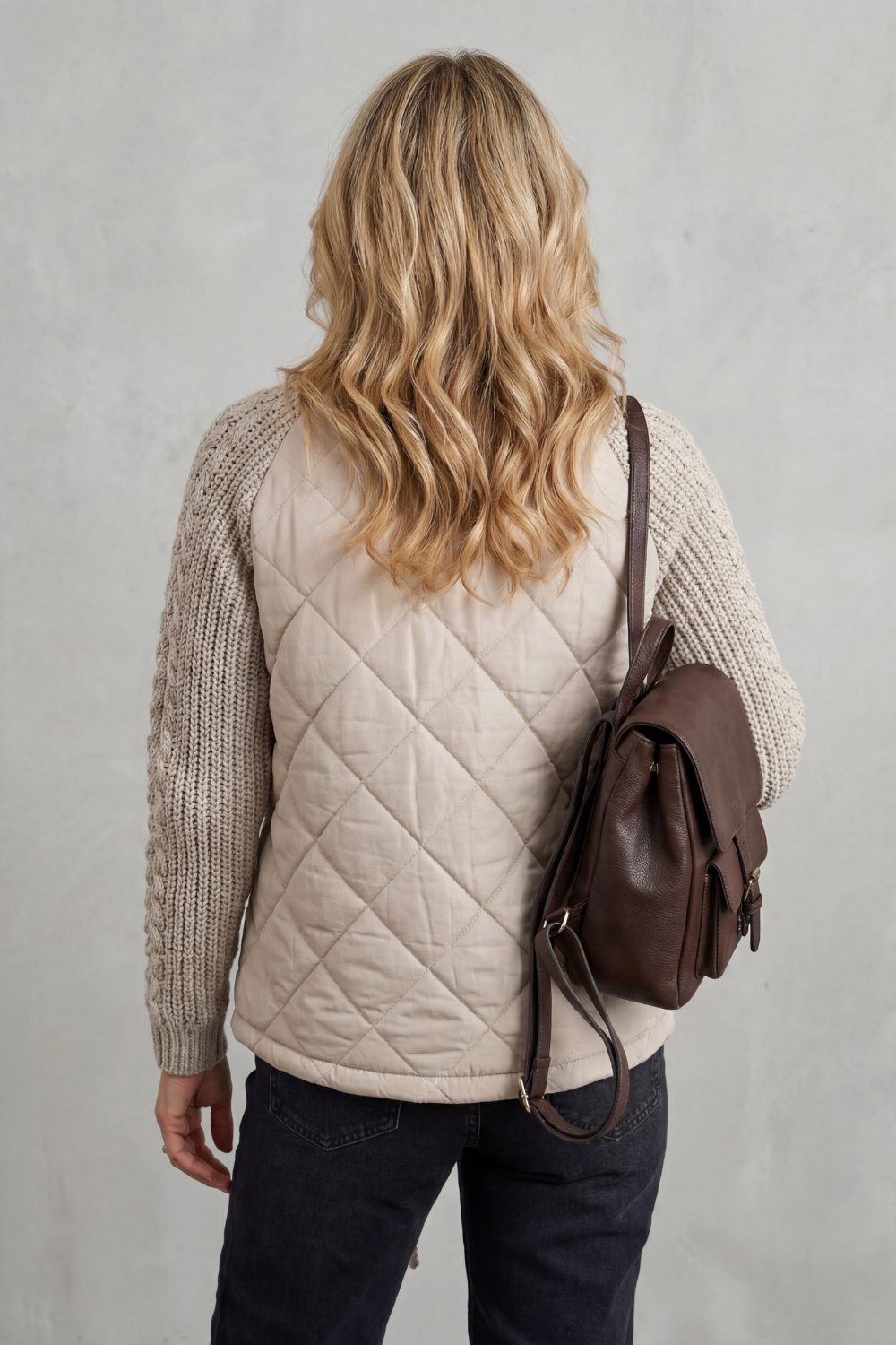 Women's Quilted Jacket with Cable Knit Sleeves and Zip Front